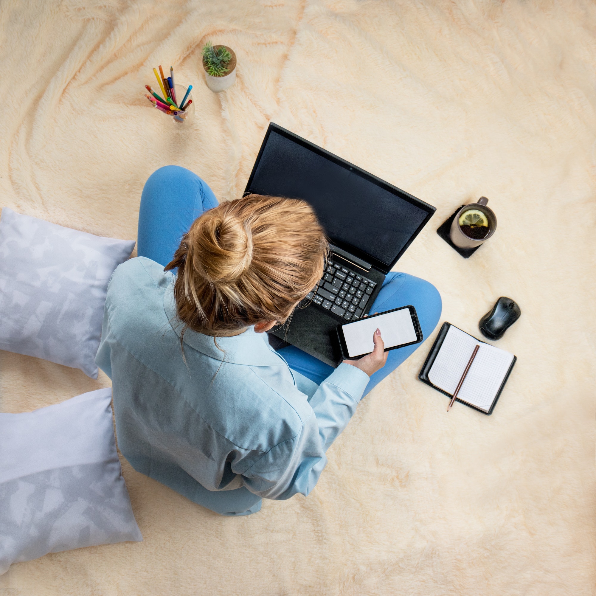 freelancing remote work concept laptop smartphone and notebook at home.jpg