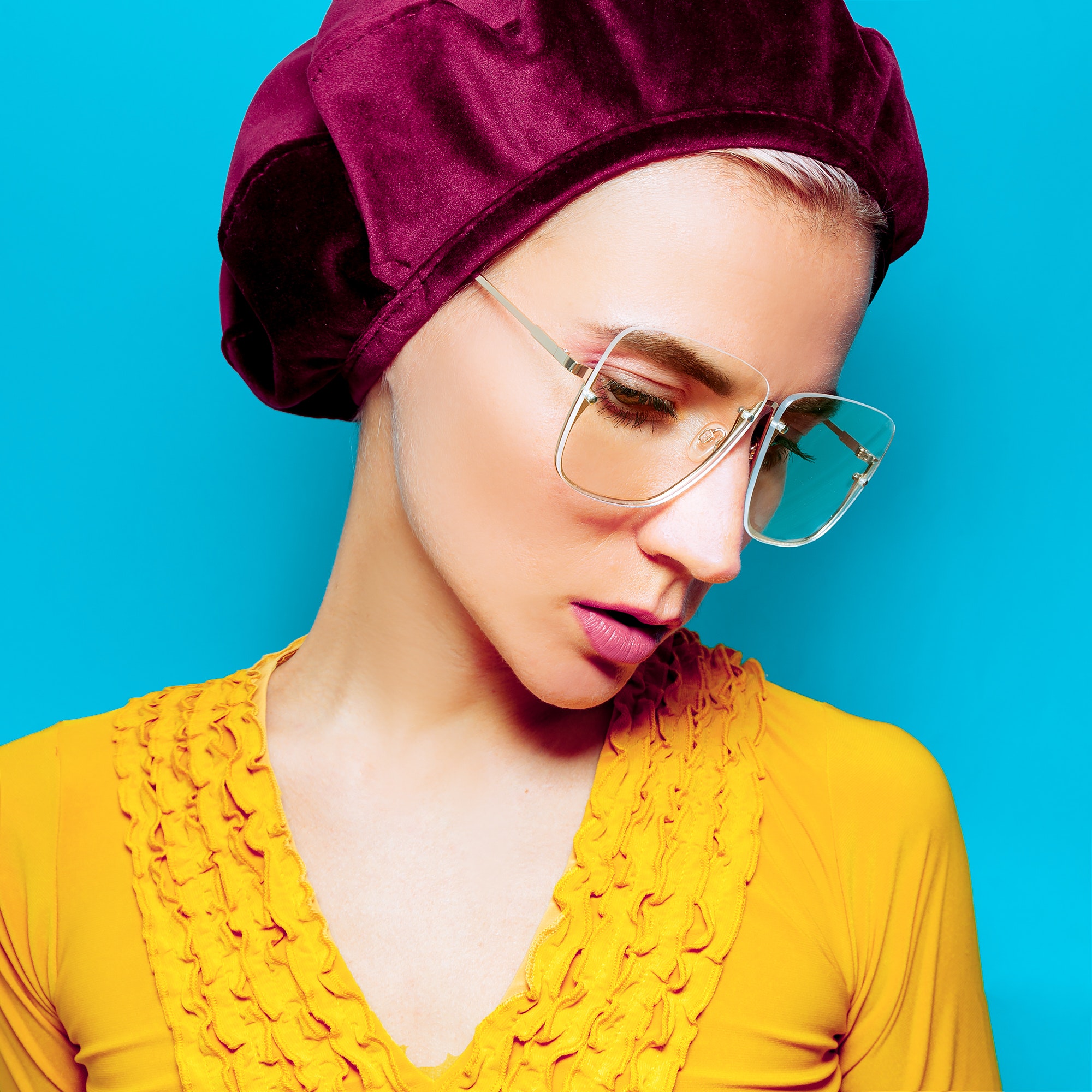 model in fashion accessory beret and glasses retro style.jpg