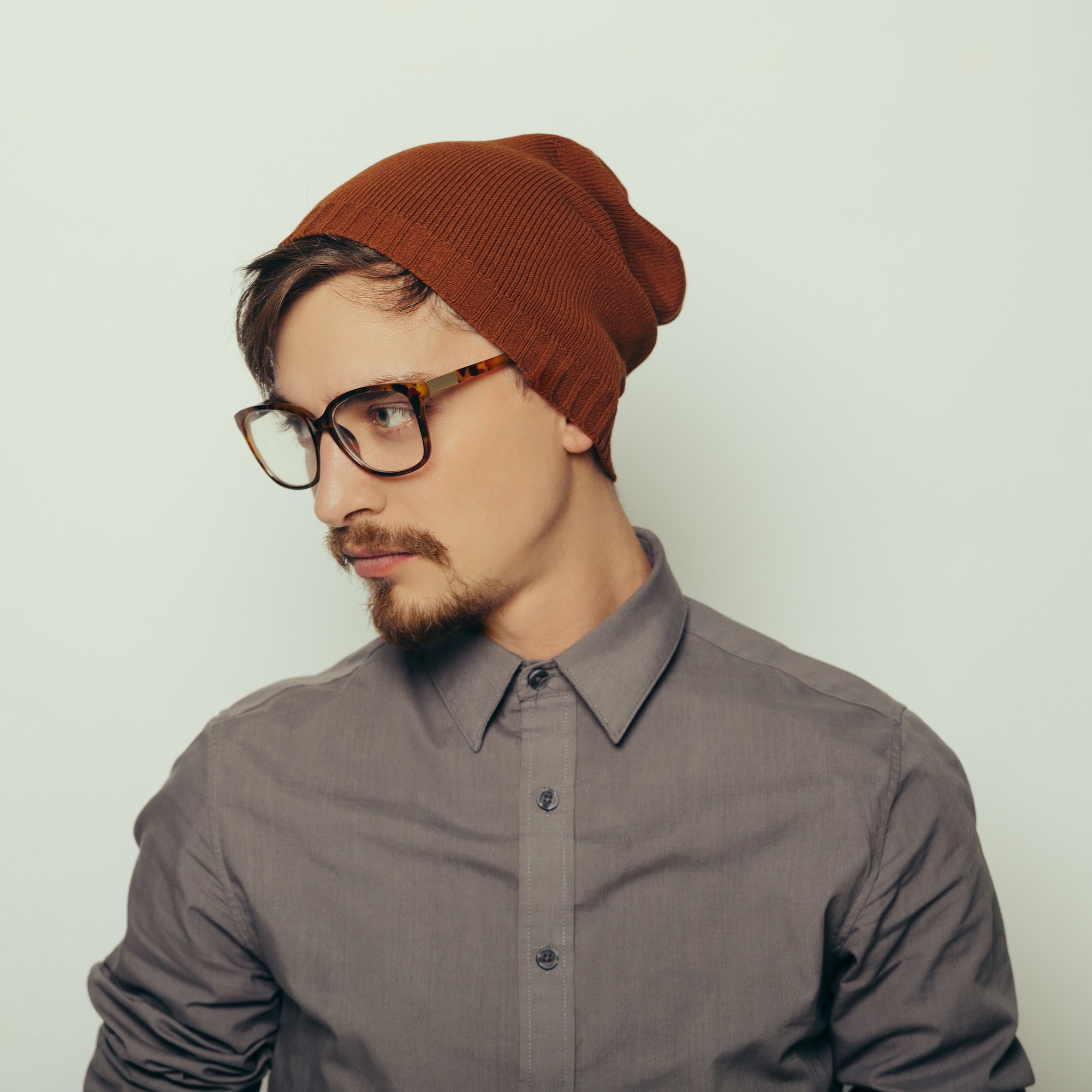 portrait of an interesting young man in winter clothes.jpg